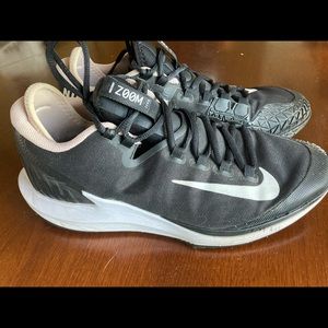 Women’s Nike court tennis sneakers. Size 10. Black. Gently used.